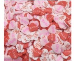 CONFETTI CORAZONES ROJOS Y ROSADOS 0.5OZ